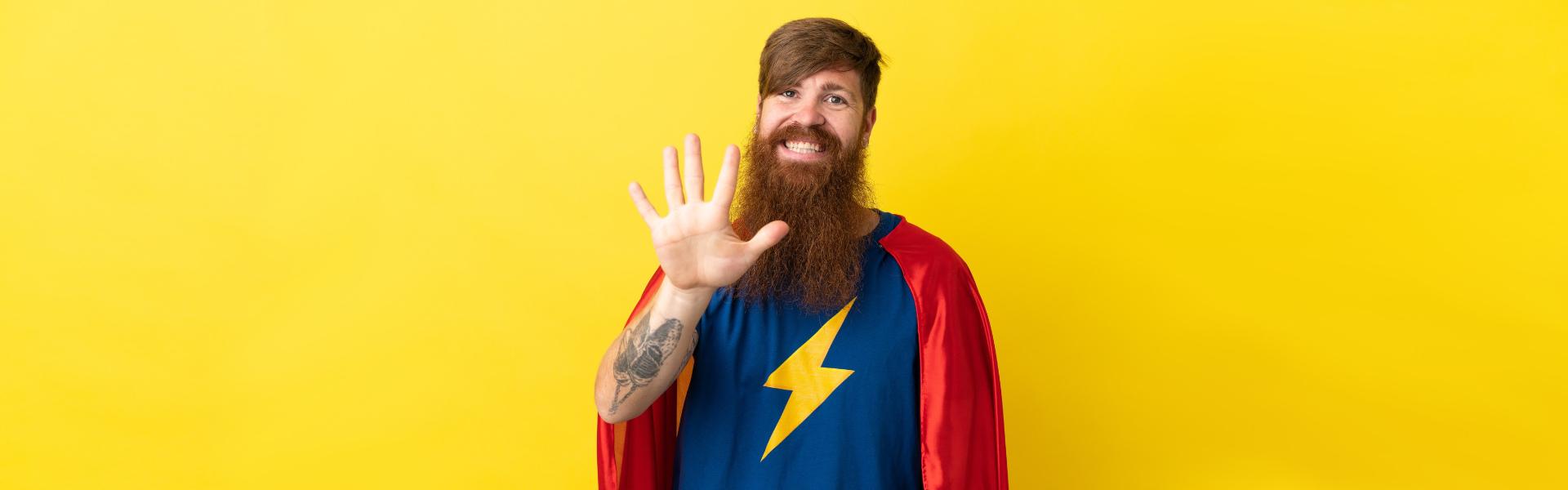 redhead super hero man counting five with fingers